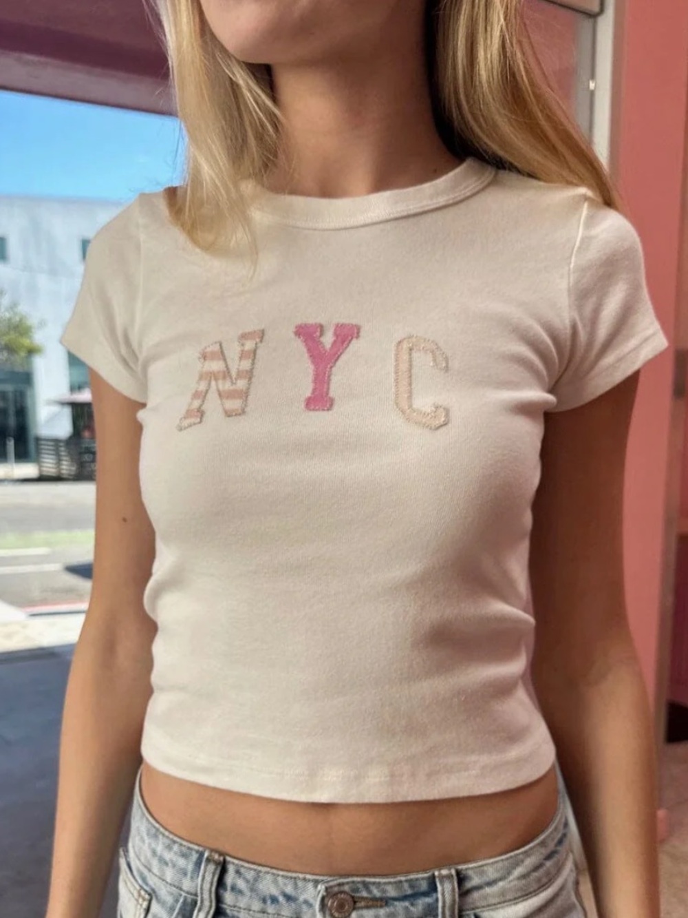 Brandy Melville Women's White 'NYC' Ribbed Baby Tee cropped